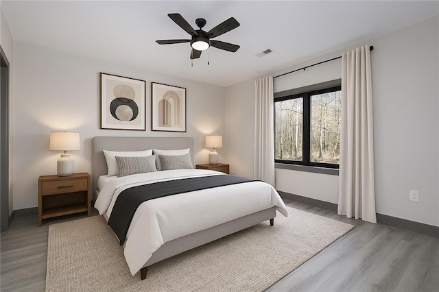 221 Dragonfly Cv, Toccoa, GA 30577 - bedroom with wood finished floors and a ceiling fan