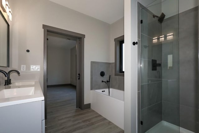 221 Dragonfly Cv, Toccoa, GA 30577 - full bath with a garden tub, double vanity, wood finished floors, and tiled shower