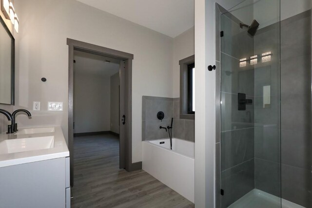 unfurnished bedroom featuring ceiling fan, light hardwood / wood-style flooring, and a closet