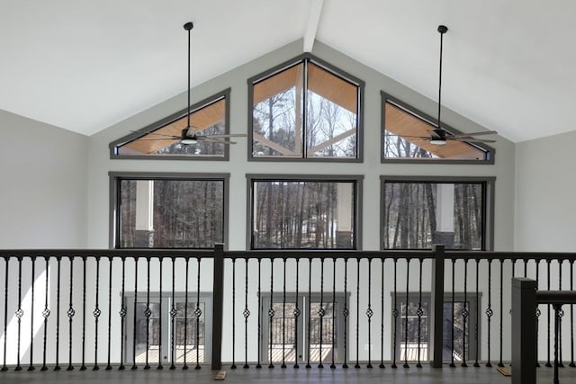 room details with beamed ceiling and ceiling fan