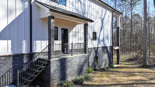 view of home's exterior with a yard and board and batten siding