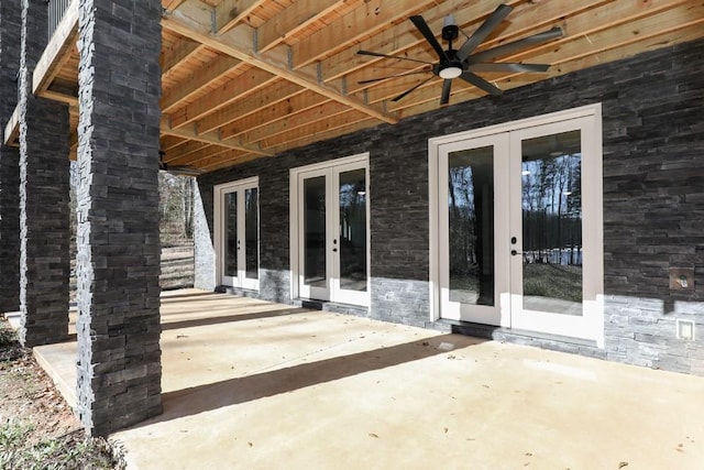 view of patio featuring french doors and ceiling fan