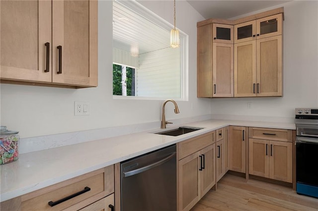 554 Mcdaniel Station Rd SW, Calhoun, GA 30701 - kitchen featuring appliances with stainless steel finishes, a sink, light brown cabinets, light wood finished floors, and glass insert cabinets