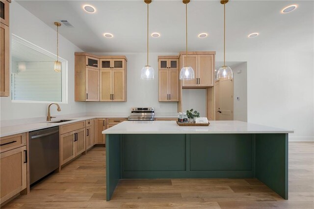 554 Mcdaniel Station Rd SW, Calhoun, GA 30701 - kitchen with stainless steel appliances, a sink, light brown cabinetry, glass insert cabinets, and light countertops