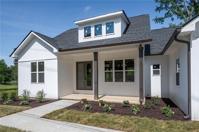 554 Mcdaniel Station Rd SW, Calhoun, GA 30701 - modern farmhouse style home with a porch and a shingled roof