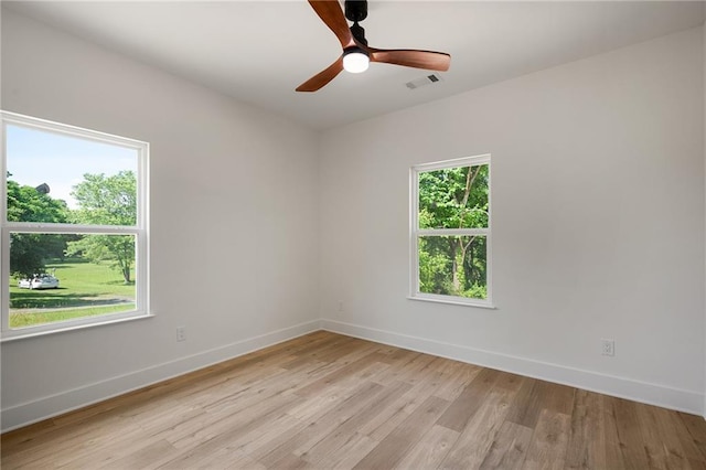 554 Mcdaniel Station Rd SW, Calhoun, GA 30701 - empty room featuring baseboards, light wood-style flooring, and ceiling fan