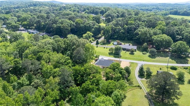 554 Mcdaniel Station Rd SW, Calhoun, GA 30701 - drone / aerial view of a heavily wooded area