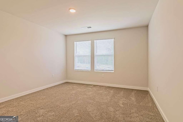 view of carpeted spare room