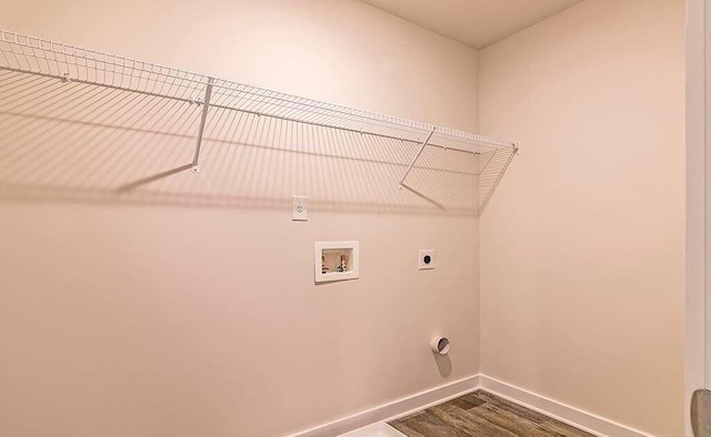 laundry room featuring hardwood / wood-style flooring, washer hookup, and hookup for an electric dryer
