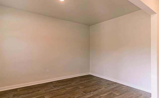 interior space with dark wood-type flooring