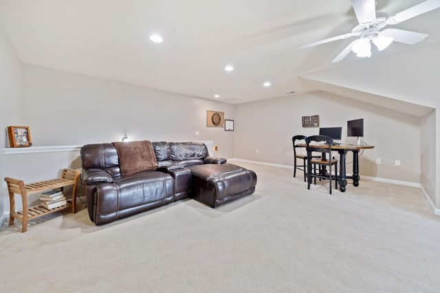 living room with light carpet, ceiling fan, and vaulted ceiling