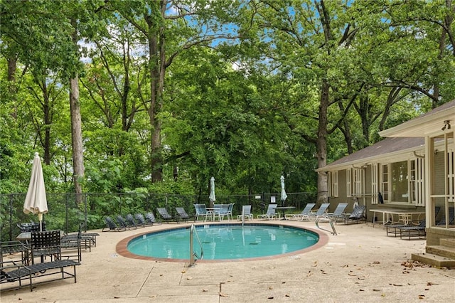 1719 Woodcliff Ct NE, Atlanta, GA 30329 - community pool with a patio and view of scattered trees