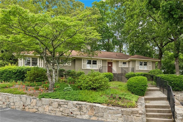 1719 Woodcliff Ct NE, Atlanta, GA 30329 - ranch-style home featuring stairs