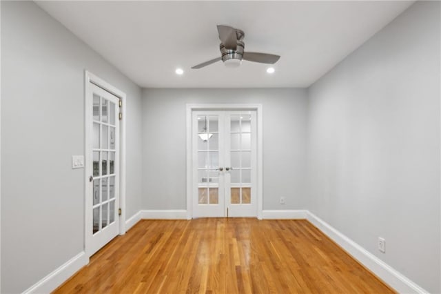 1719 Woodcliff Ct NE, Atlanta, GA 30329 - unfurnished room featuring french doors, baseboards, light wood-style flooring, recessed lighting, and a ceiling fan