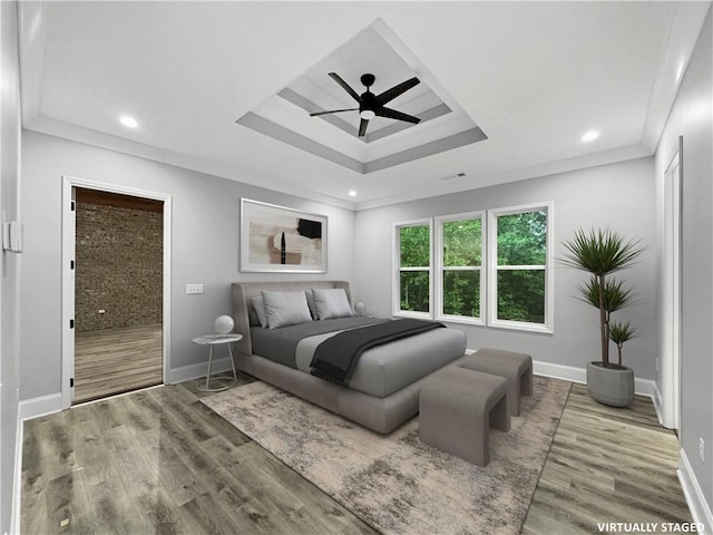 244 Coastline Rd, Fayetteville, GA 30214 - bedroom featuring baseboards, wood finished floors, a tray ceiling, a ceiling fan, and recessed lighting