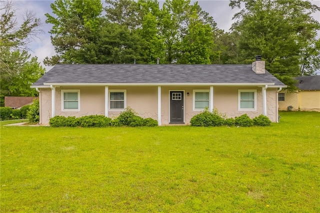 225 Fireside Way, Fairburn, GA 30213 - single story home featuring stucco siding, a front lawn, and a chimney