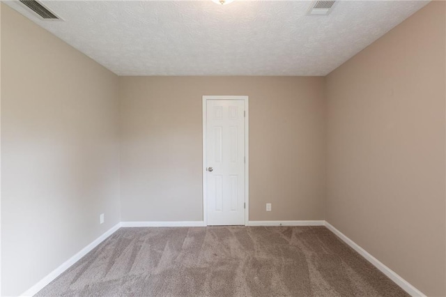 225 Fireside Way, Fairburn, GA 30213 - carpeted empty room with baseboards and a textured ceiling