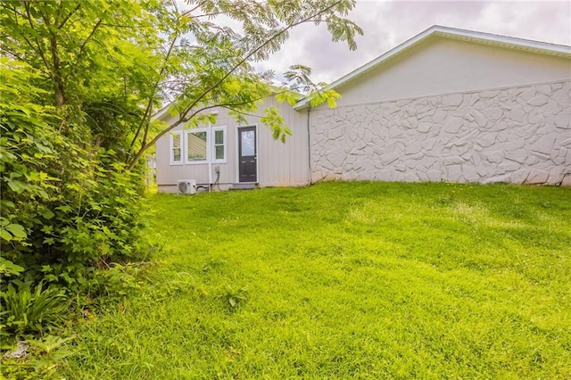 225 Fireside Way, Fairburn, GA 30213 - rear view of property featuring a lawn