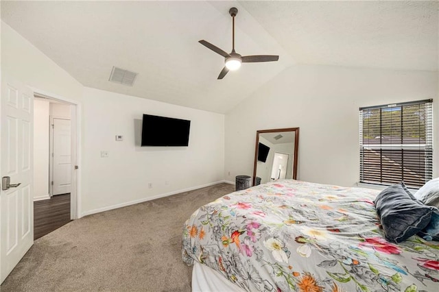 carpeted bedroom with baseboards, visible vents, a ceiling fan, and lofted ceiling