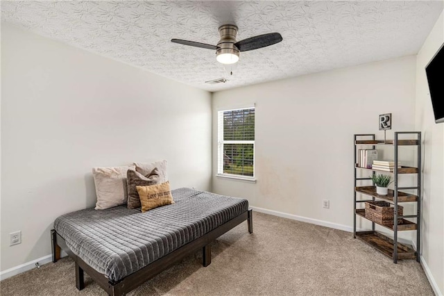 bedroom with baseboards, carpet flooring, and visible vents