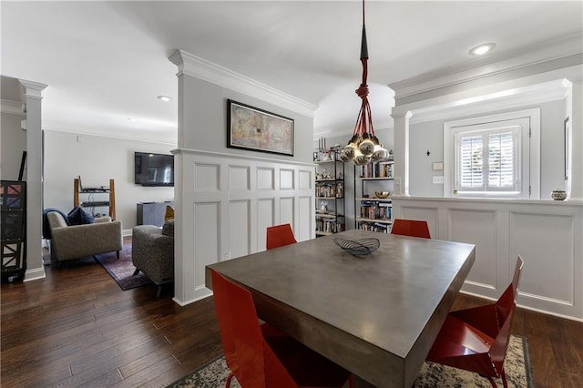 dining area featuring recessed lighting, a decorative wall, dark wood-type flooring, decorative columns, and crown molding