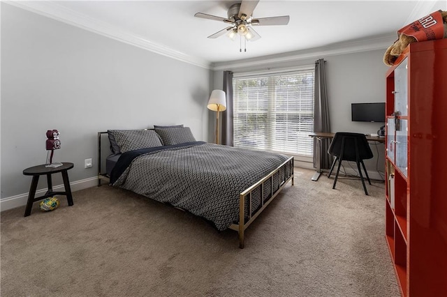 bedroom featuring ceiling fan, carpet floors, ornamental molding, and baseboards