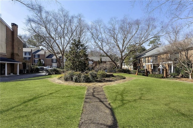 view of yard featuring a residential view