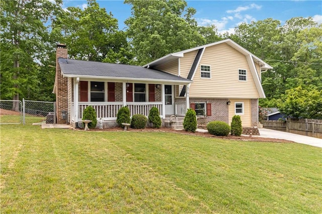 3781 Cherokee Trl, Suwanee, GA 30024 - tri-level home featuring a porch, brick siding, a chimney, and a front yard