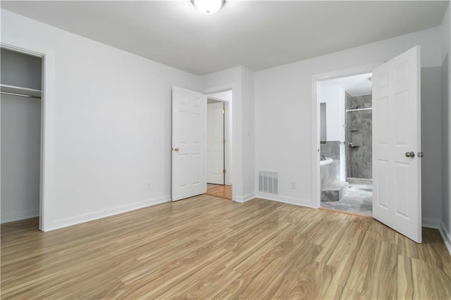 3781 Cherokee Trl, Suwanee, GA 30024 - unfurnished bedroom with light wood finished floors, baseboards, a closet, and ensuite bath