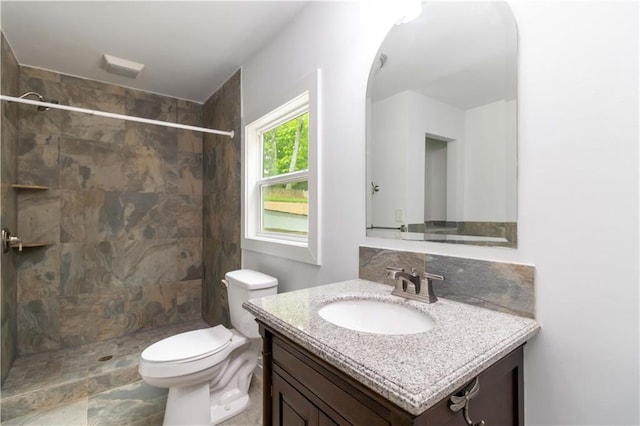 3781 Cherokee Trl, Suwanee, GA 30024 - full bathroom with vanity, toilet, and tiled shower