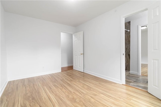 3781 Cherokee Trl, Suwanee, GA 30024 - spare room with light wood-style flooring and baseboards