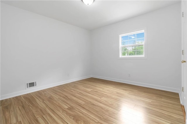 3781 Cherokee Trl, Suwanee, GA 30024 - unfurnished room with light wood-type flooring, visible vents, and baseboards