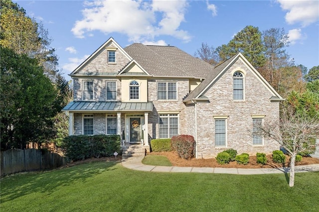 view of front facade with a front lawn