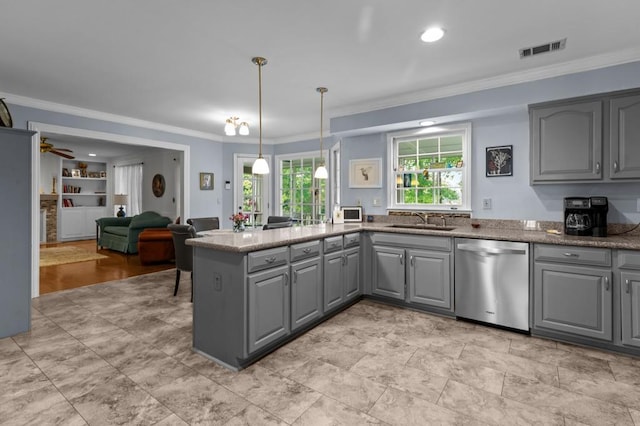 kitchen with stainless steel dishwasher, gray cabinets, ornamental molding, a sink, and a peninsula