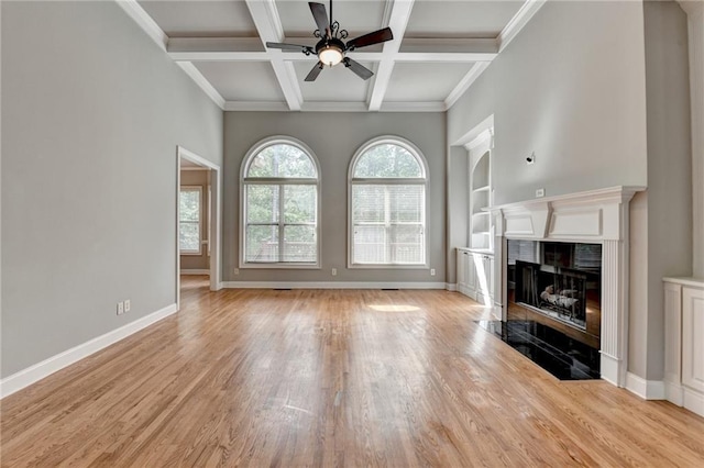 5195 Stefan Ridge Way, Buford, GA 30519 - unfurnished living room featuring coffered ceiling, a fireplace, light wood-type flooring, baseboards, and ceiling fan