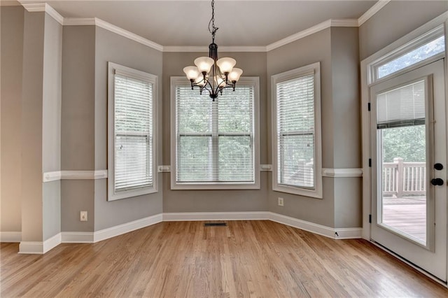 5195 Stefan Ridge Way, Buford, GA 30519 - unfurnished dining area featuring a wealth of natural light, light wood-style floors, visible vents, and a notable chandelier