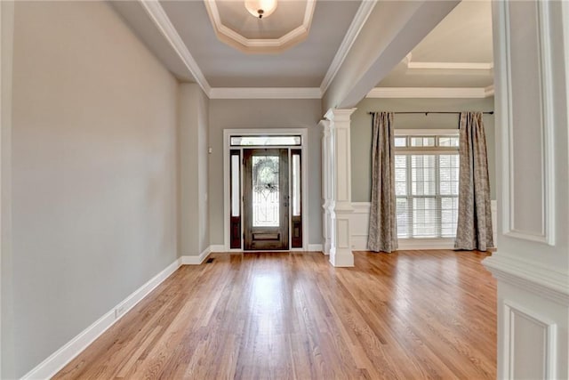 5195 Stefan Ridge Way, Buford, GA 30519 - foyer entrance featuring ornamental molding, light wood-style floors, a healthy amount of sunlight, and decorative columns