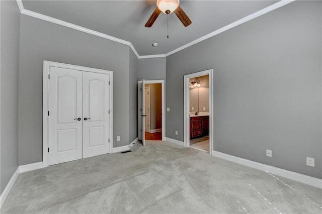 5195 Stefan Ridge Way, Buford, GA 30519 - unfurnished bedroom with ornamental molding, carpet, a closet, and baseboards