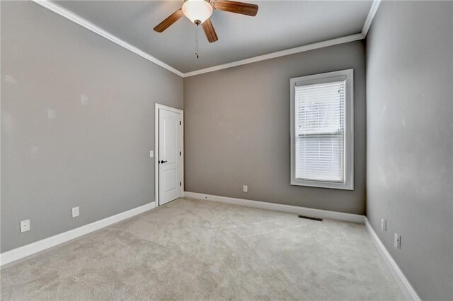 5195 Stefan Ridge Way, Buford, GA 30519 - spare room featuring ornamental molding, carpet, and a ceiling fan