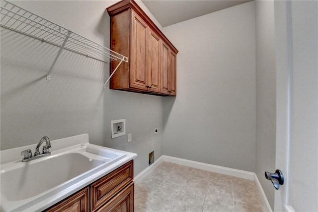 5195 Stefan Ridge Way, Buford, GA 30519 - washroom with a sink, cabinet space, washer hookup, hookup for an electric dryer, and baseboards
