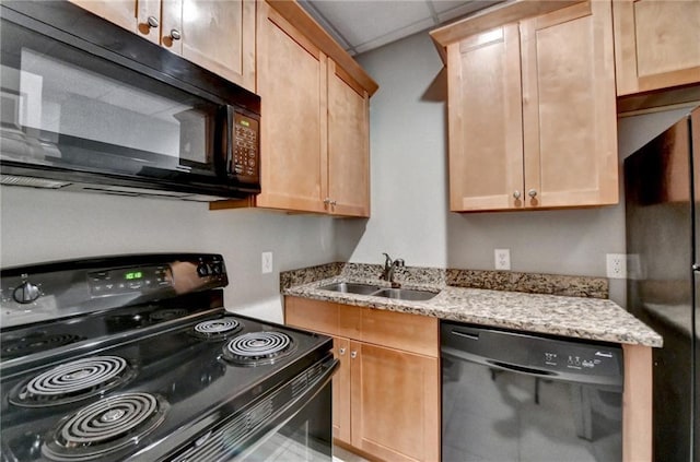 5195 Stefan Ridge Way, Buford, GA 30519 - kitchen with light stone counters, light brown cabinets, black appliances, and a sink