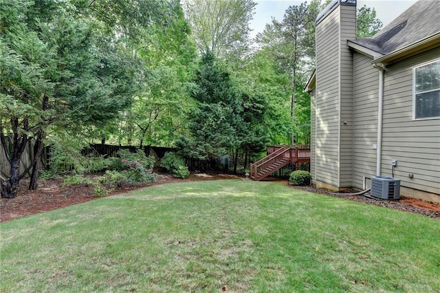 5195 Stefan Ridge Way, Buford, GA 30519 - view of yard with central AC unit, stairs, a wooden deck, and fence