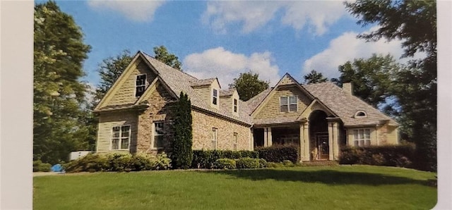 5195 Stefan Ridge Way, Buford, GA 30519 - view of front of home with a chimney and a front yard