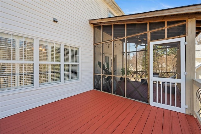 wooden terrace with a sunroom