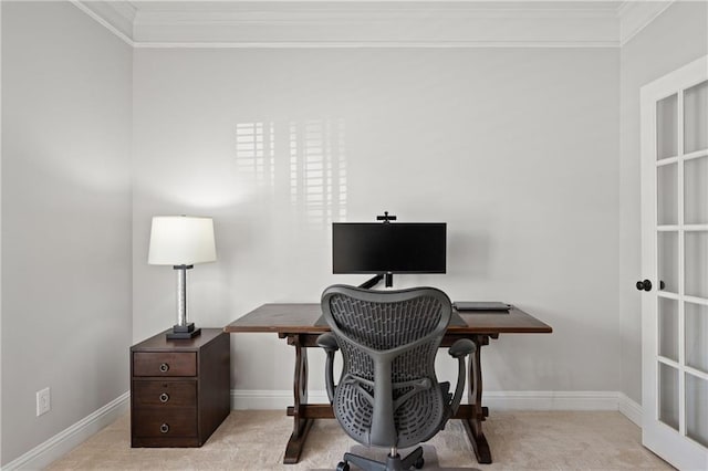 office featuring baseboards, ornamental molding, and light colored carpet