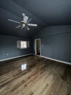 additional living space with hardwood / wood-style flooring, ceiling fan, and lofted ceiling