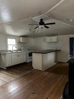 kitchen with dark wood-type flooring, sink, white cabinetry, ceiling fan, and white range with electric cooktop