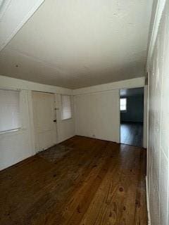 interior space with dark wood-type flooring