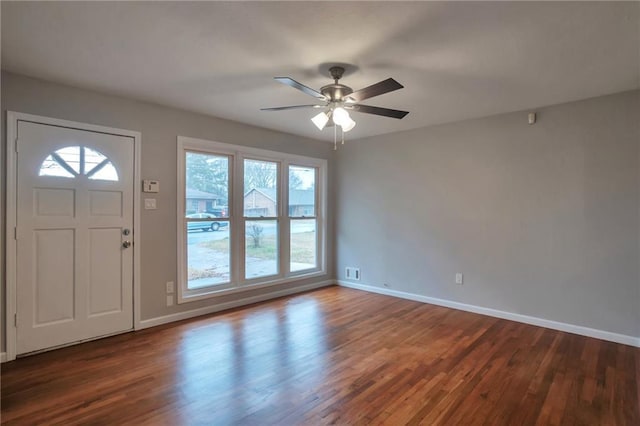 entrance foyer featuring ceiling fan and dark wood-type flooring