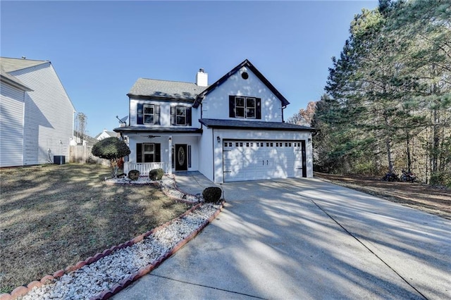 view of front of home with a garage and covered porch